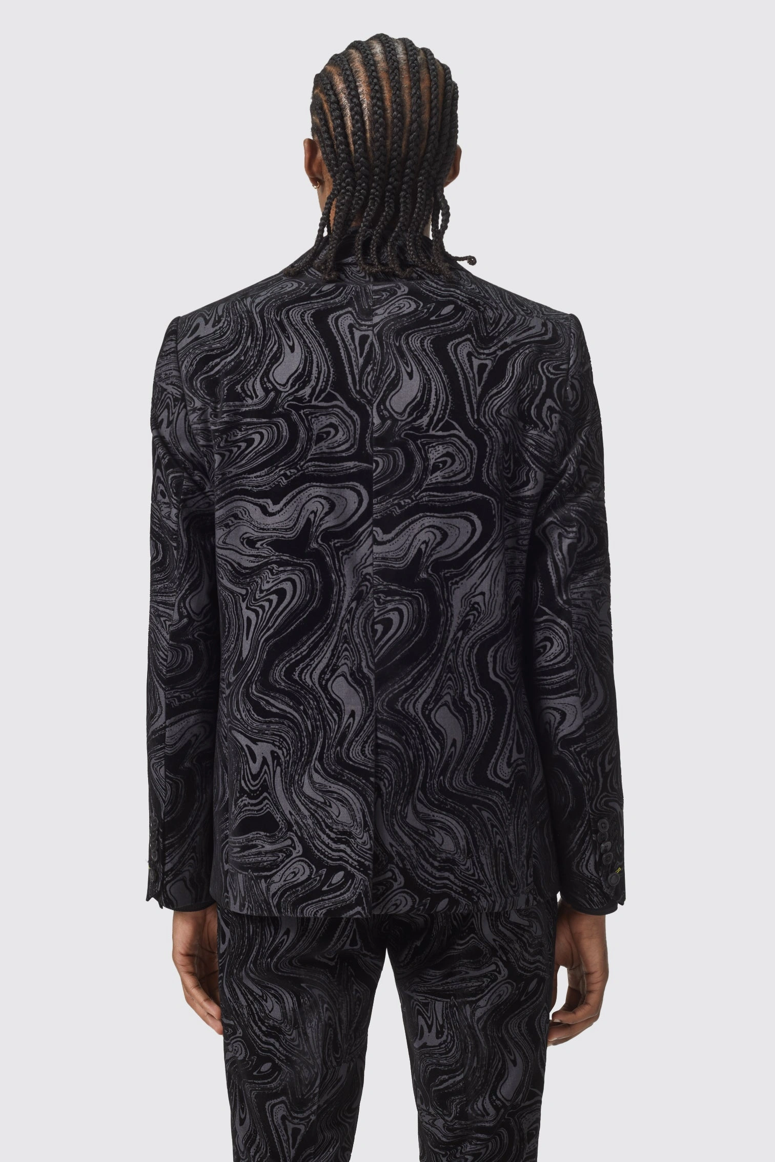 Angelou's Midnight Black Suit: Sharp Fit, Timeless Style, Absolute Confidence.